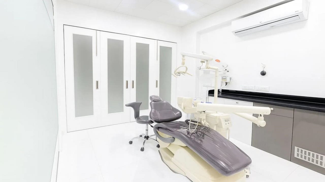 Private treatment room with a dental chair